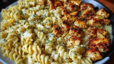 Cheesy Alfredo Twisted Pasta with Golden Garlic Butter Chicken in Creamy Sauce