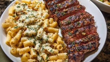 Cheesy Cajun Garlic Butter Steak with Creamy Rigatoni