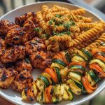 Garlic Chili Oil Chicken Bites & Cajun Alfredo with Charred Zucchini Twists