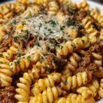 Cheesy Garlic Twisted Pasta with Cajun Ground Beef and Alfredo Velveeta
