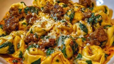 Garlic Butter Tortellini in Creamy Sauce with Beef, Italian Sausage & Spinach