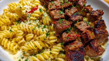 Steak Bites and Cheesy Rotini in Garlic Parmesan Sauce